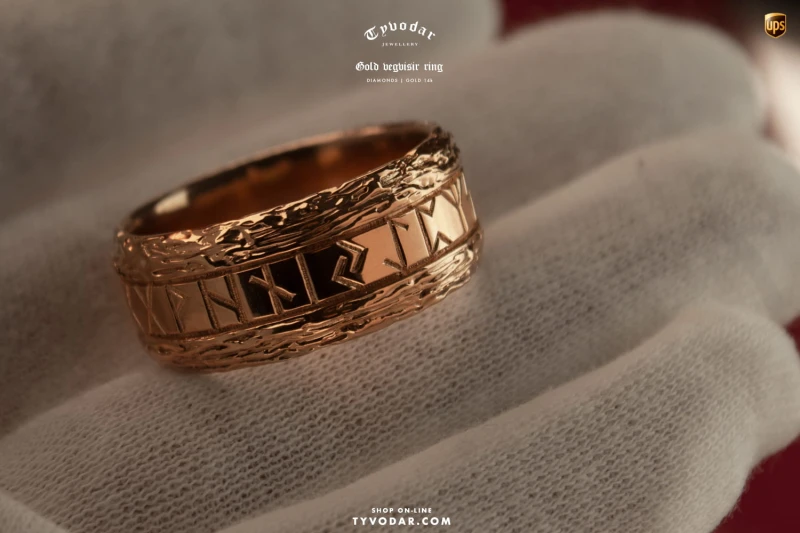 Gold vegvisir ring.jpg