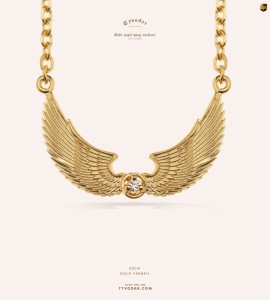 Gold angel wing necklace _v7.jpg